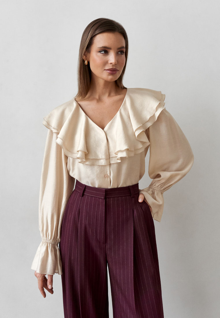 Блуза с воланами